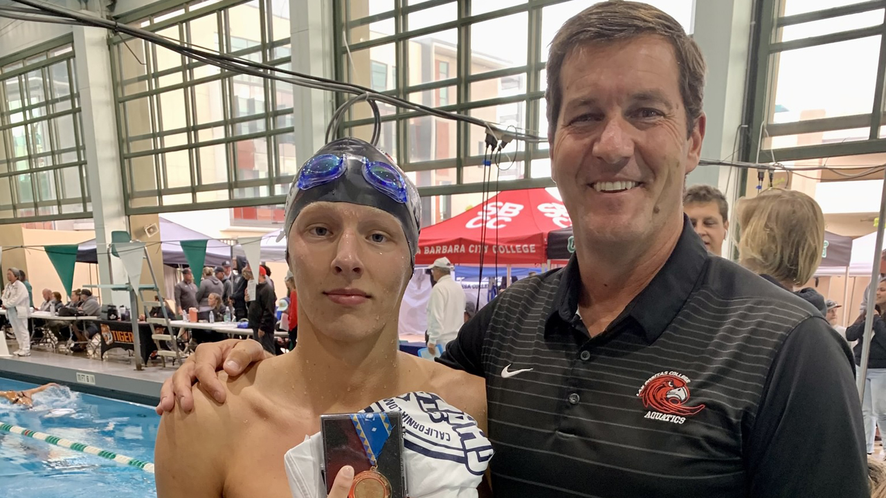 State champion Marcu Holunga and head coach Jason Craighead